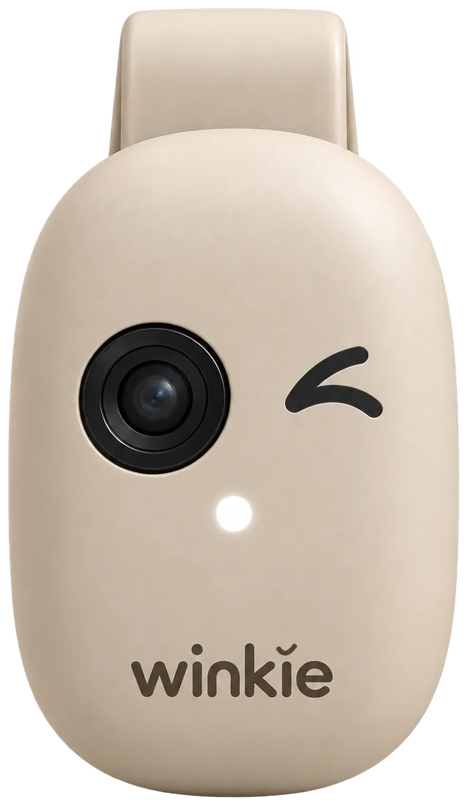 Winkie in Oat, front view: a pebble-shaped camera with a lens eye, a wink and a small light